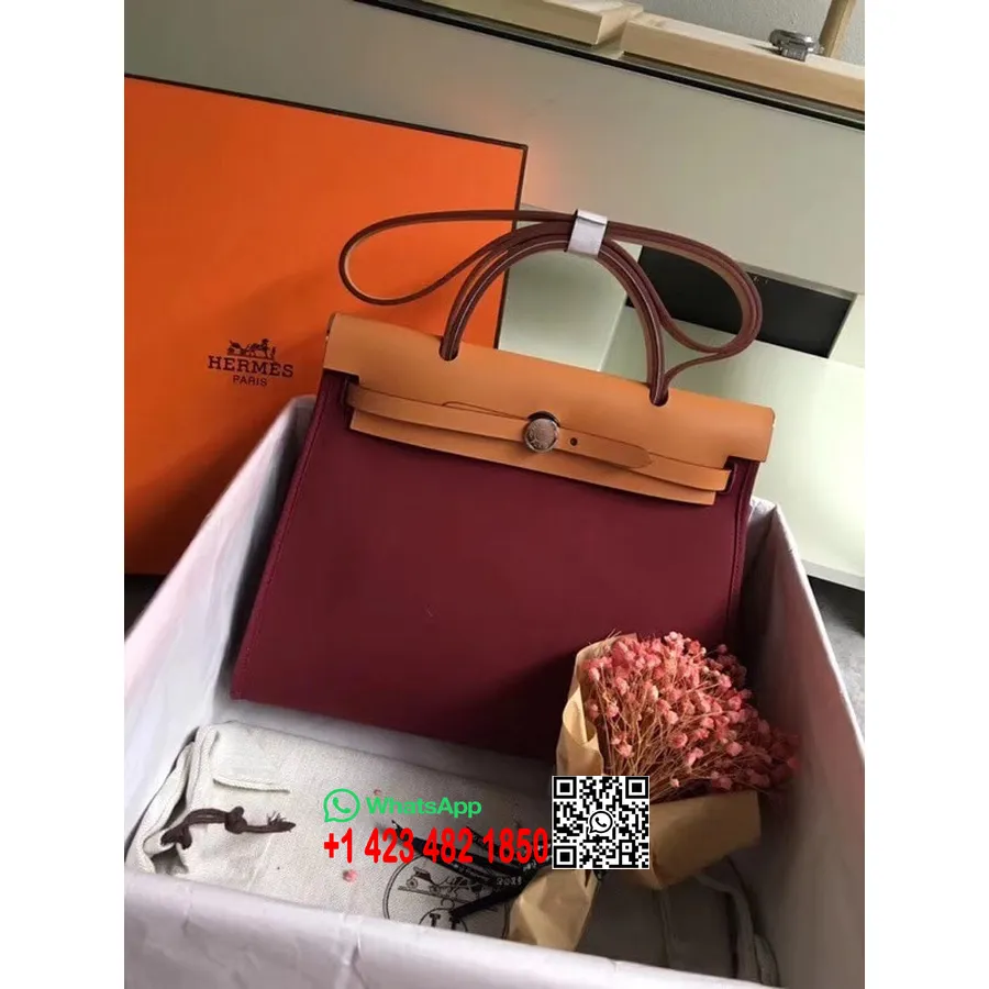 Hermes Toile H Herbag Zip PM 31 سم قطع معدنية من القماش القطني بالبلاديوم، ياقوتي/ذهبي