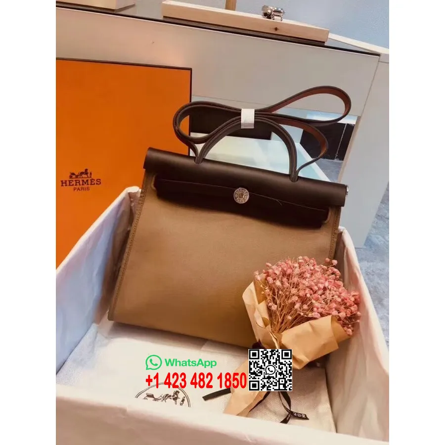 Hermes Toile H Herbag Zip PM 31 سم قطع معدنية من قماش البلاديوم، إتوب / بني