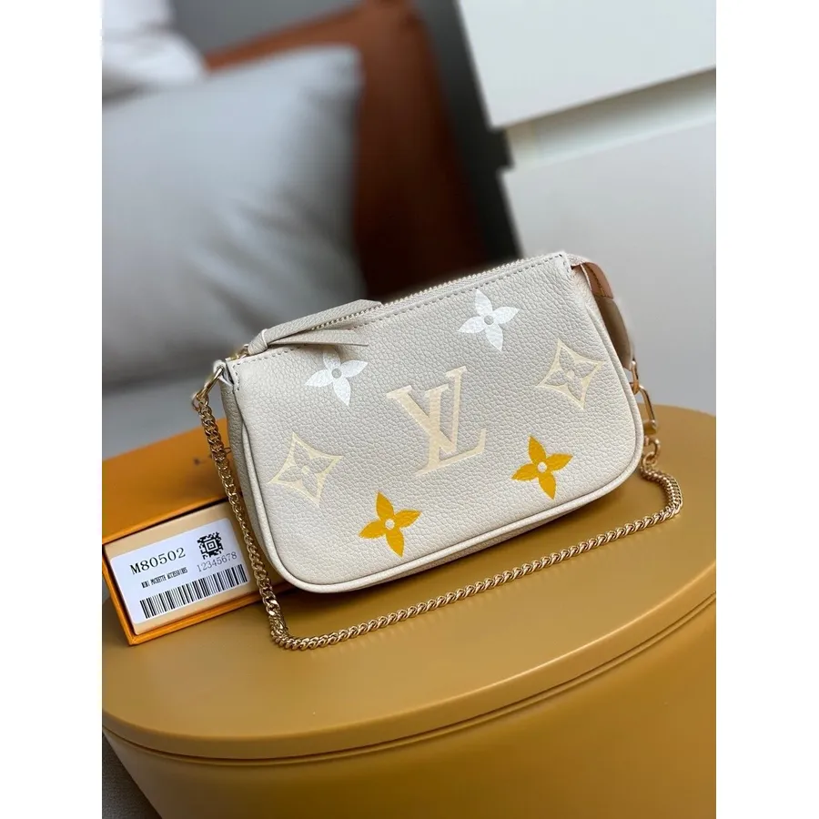 Louis Vuitton Mini Pochette Kiegészítők 15cm Monogram Empreinte Bőr Tavaszi/nyári 2021 Kollekció M80502, Krém/sáfrány